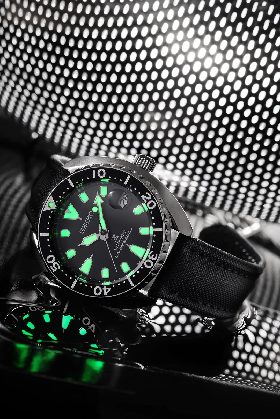Seiko wristwatch detail, studio product photograph
